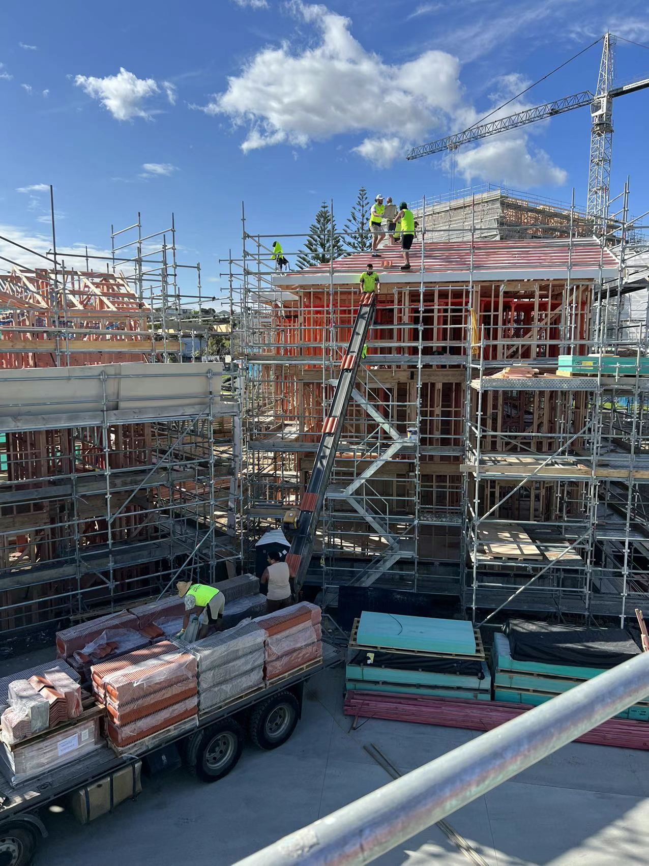 Roofing delivered across multiple apartment buildings