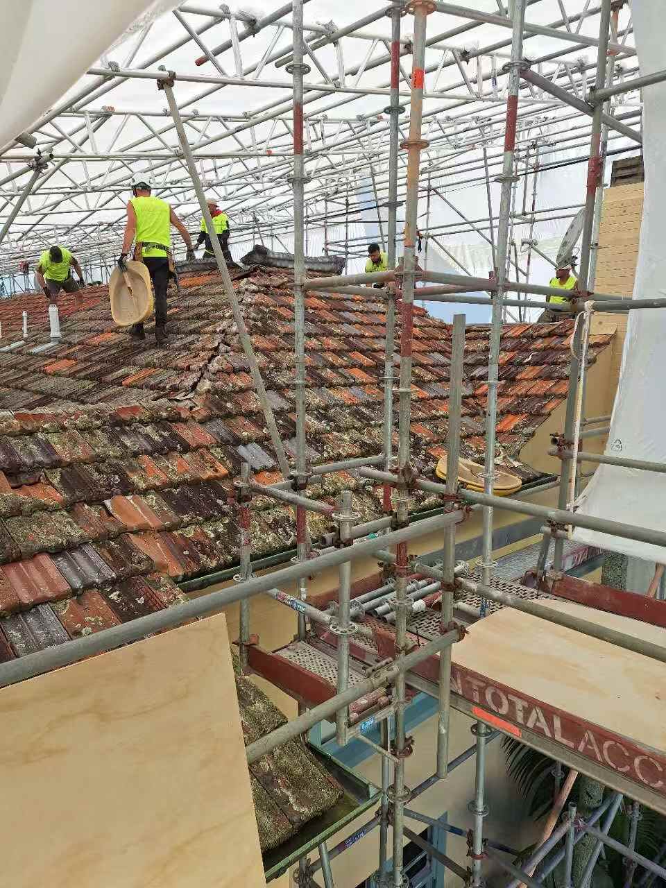 Existing tiles carefully removed