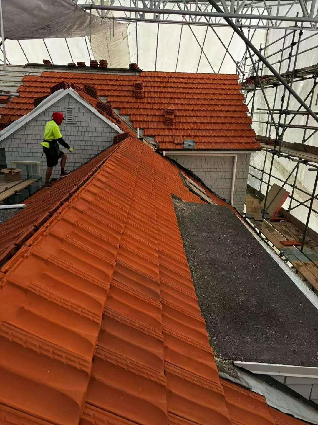 New Marseille profile roof tiles installed
