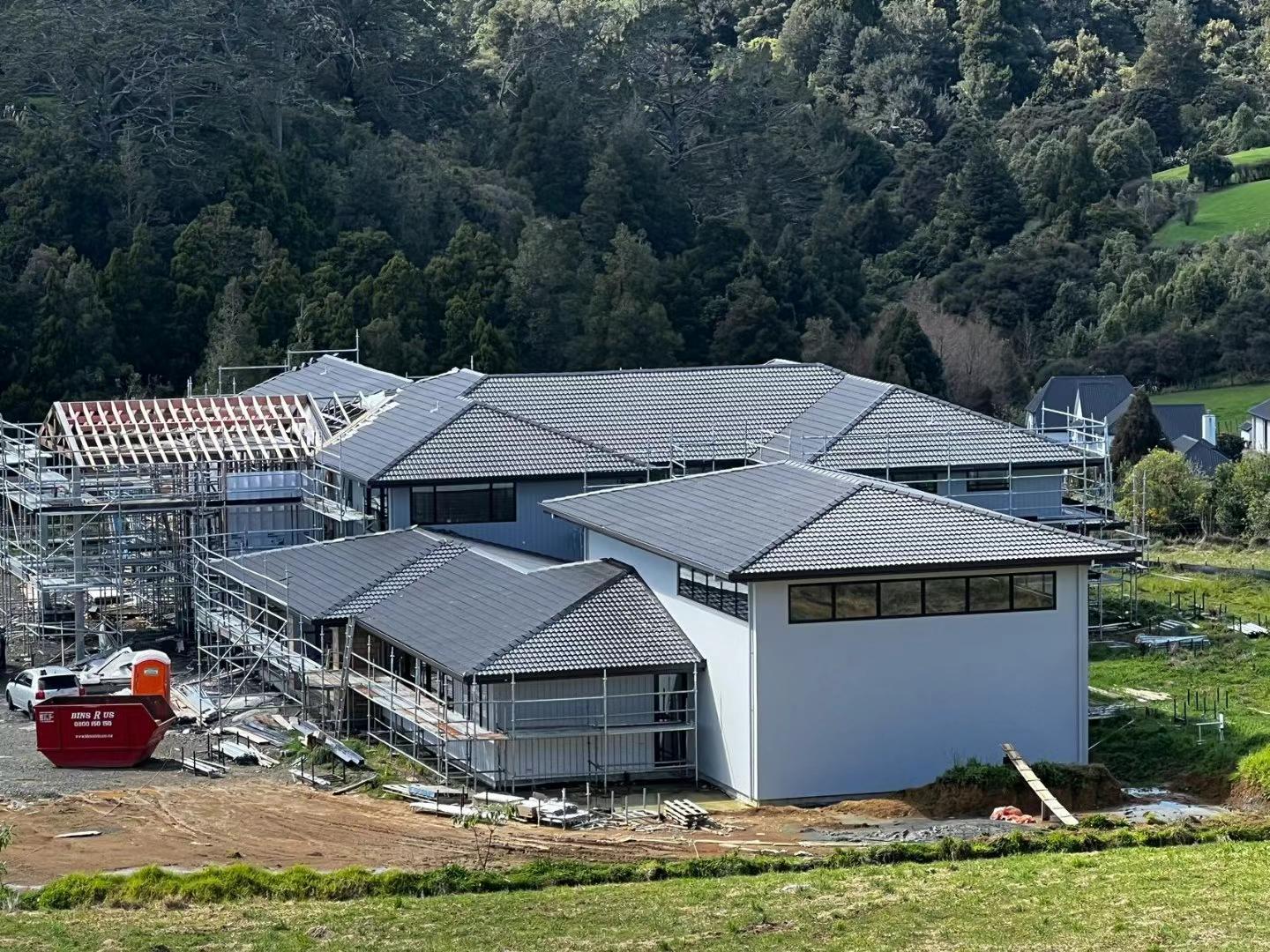 Large-scale residential roofing completed in sections