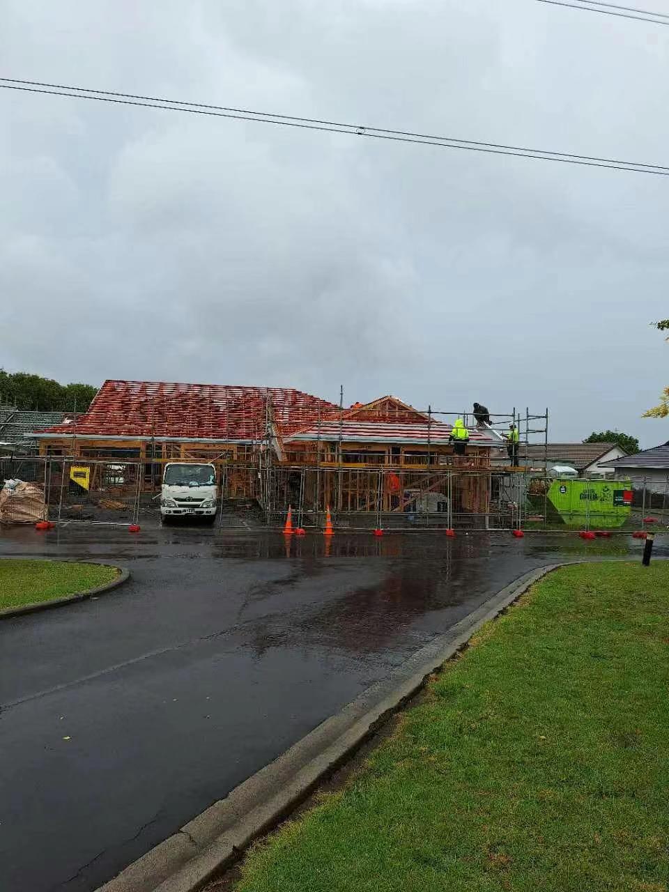 Roof framing and installation in progress