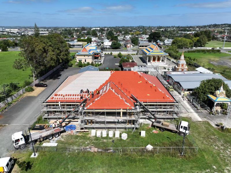 Roofing work planned around a distinctive community building