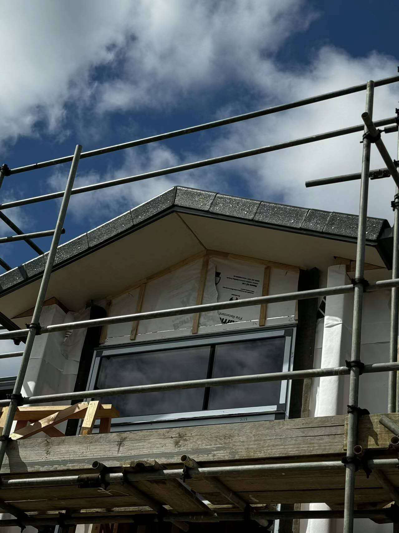 A-Line barge tiles installed with Horizon-profile roof tiles