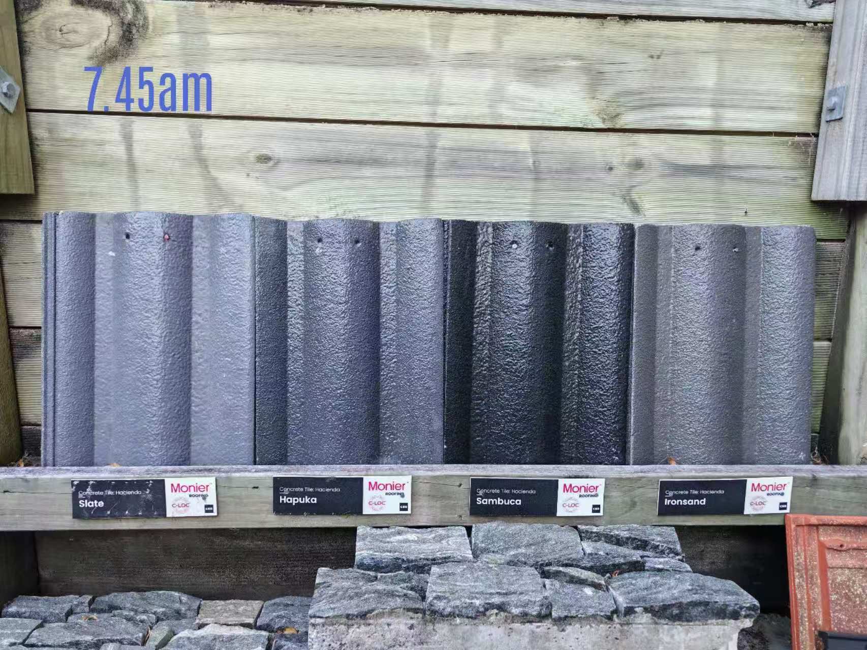 Hacienda profile concrete roof tiles in grey and black colours at 7.45am