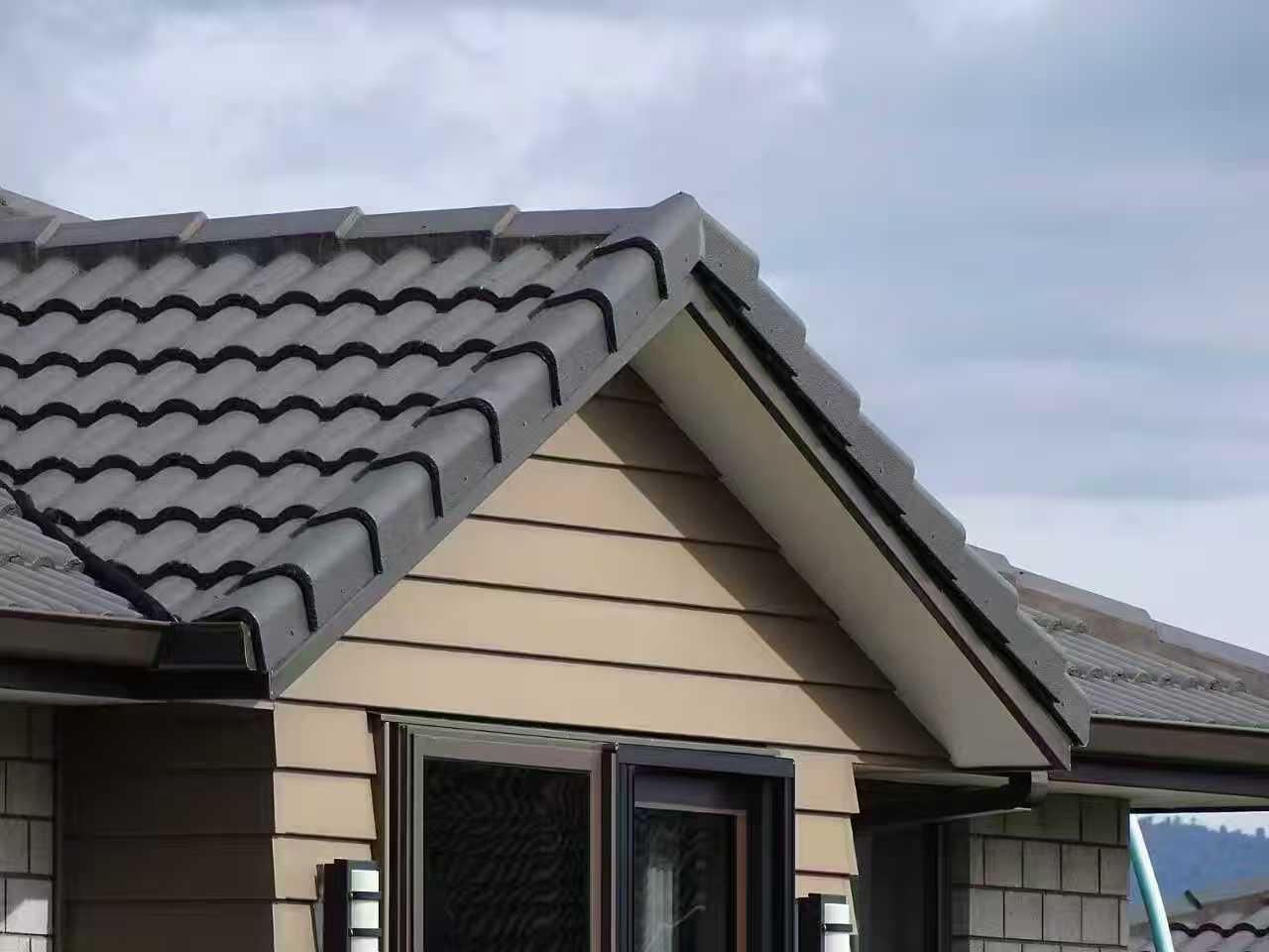 Traditional tapered barge tiles installed with Hacienda roof tiles